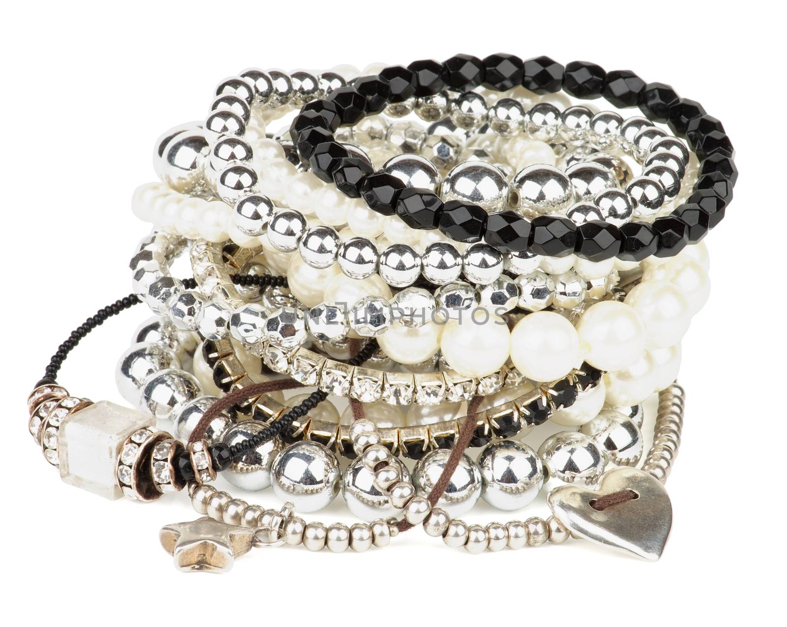 Pile of Various Pearl, Silver and Black Jewelry Gems Bracelets isolated on white background