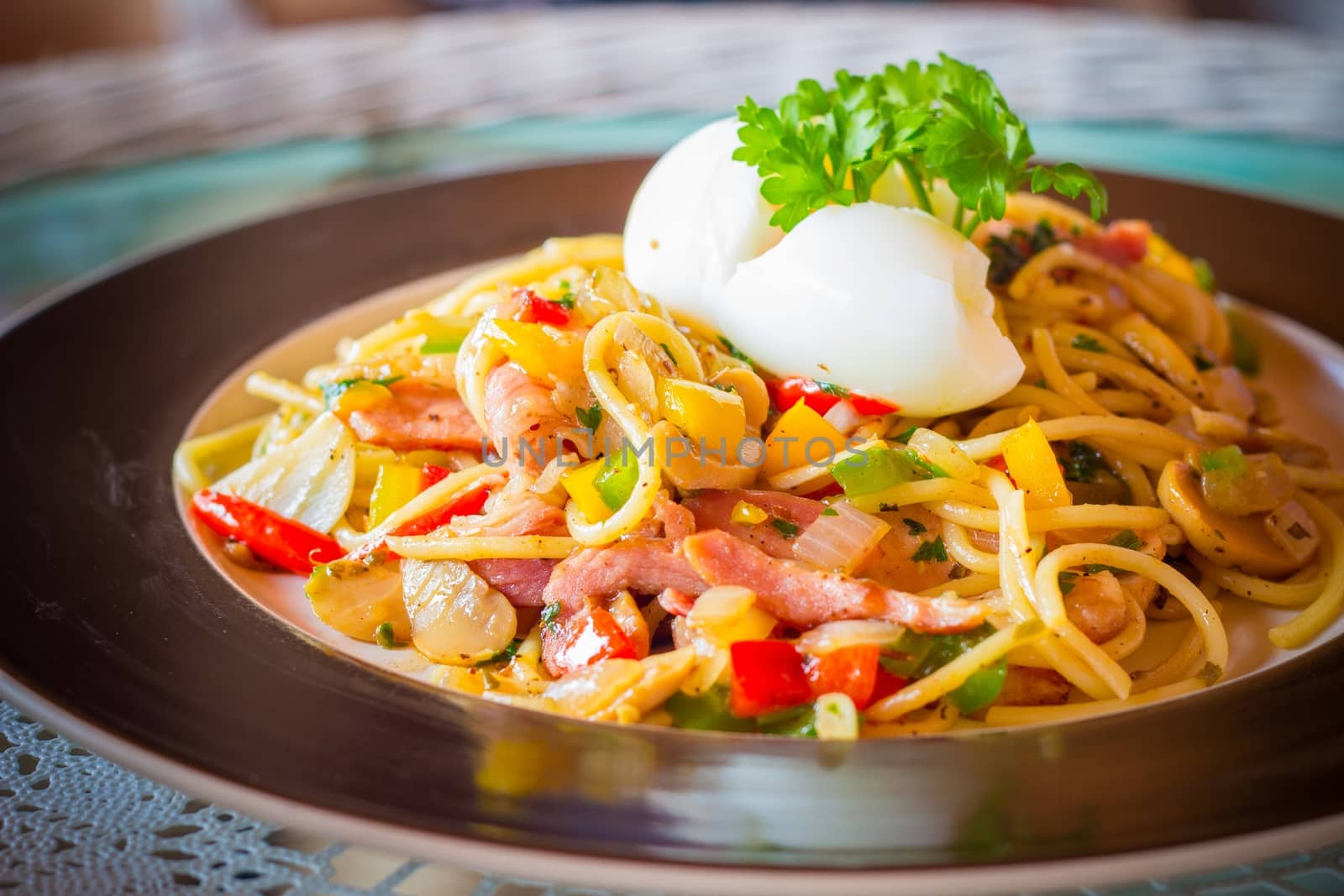 "Kee mao" Spaghetti, thai style spaghetti with boiled egg on the top.