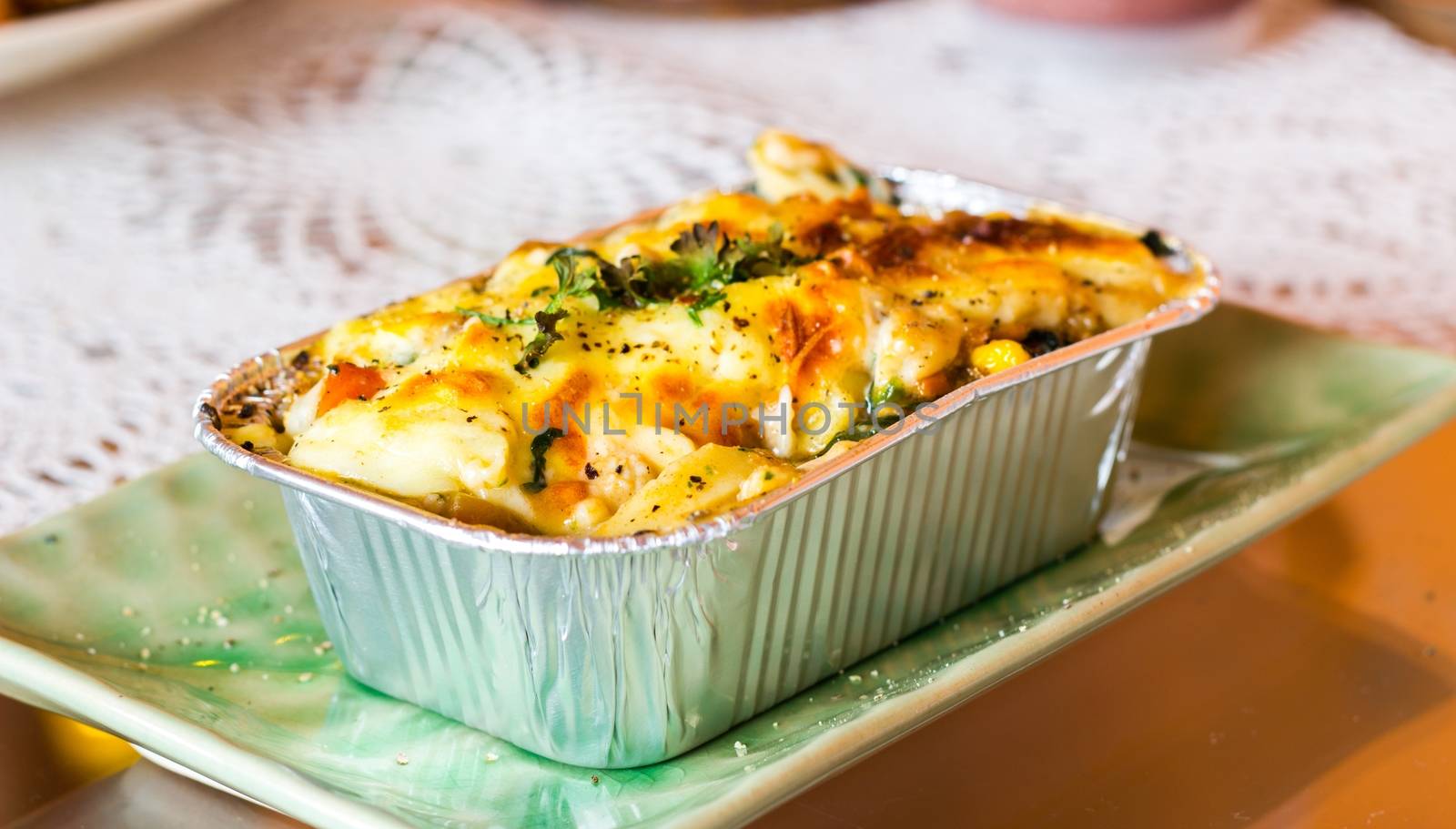 Lasagne ready meal in foil container. by a3701027