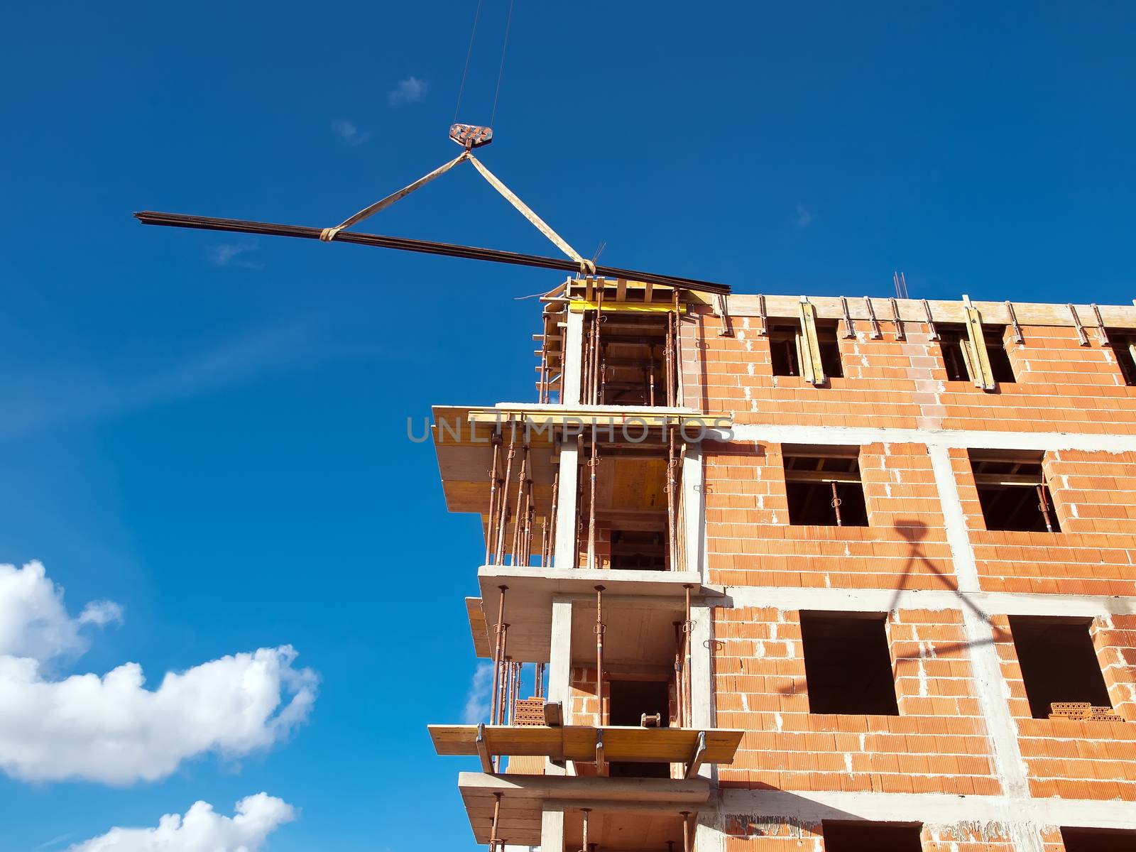 construction site with crane and building