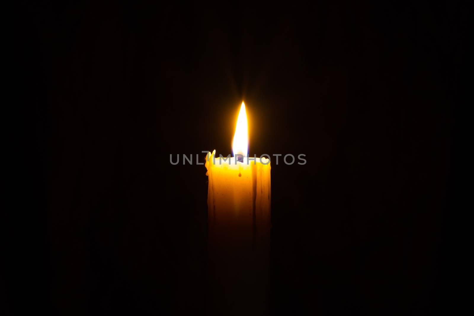 Candle in the dark with copyspce