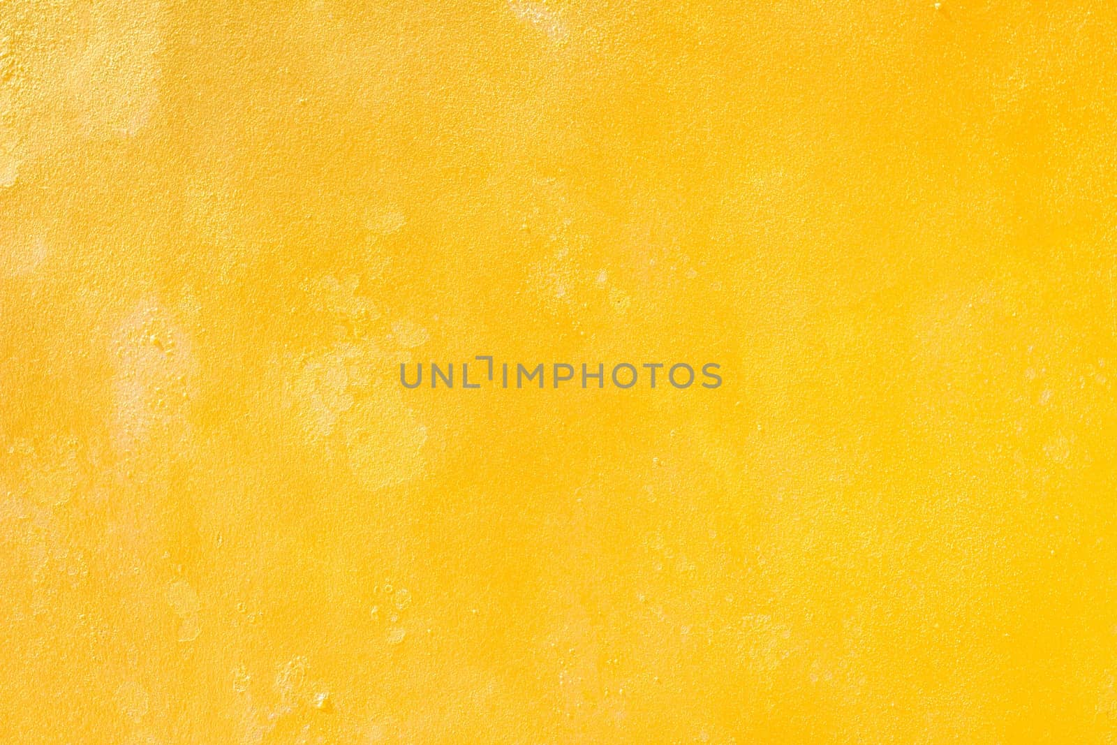 Yellow grunge cement wall, textured background by a3701027