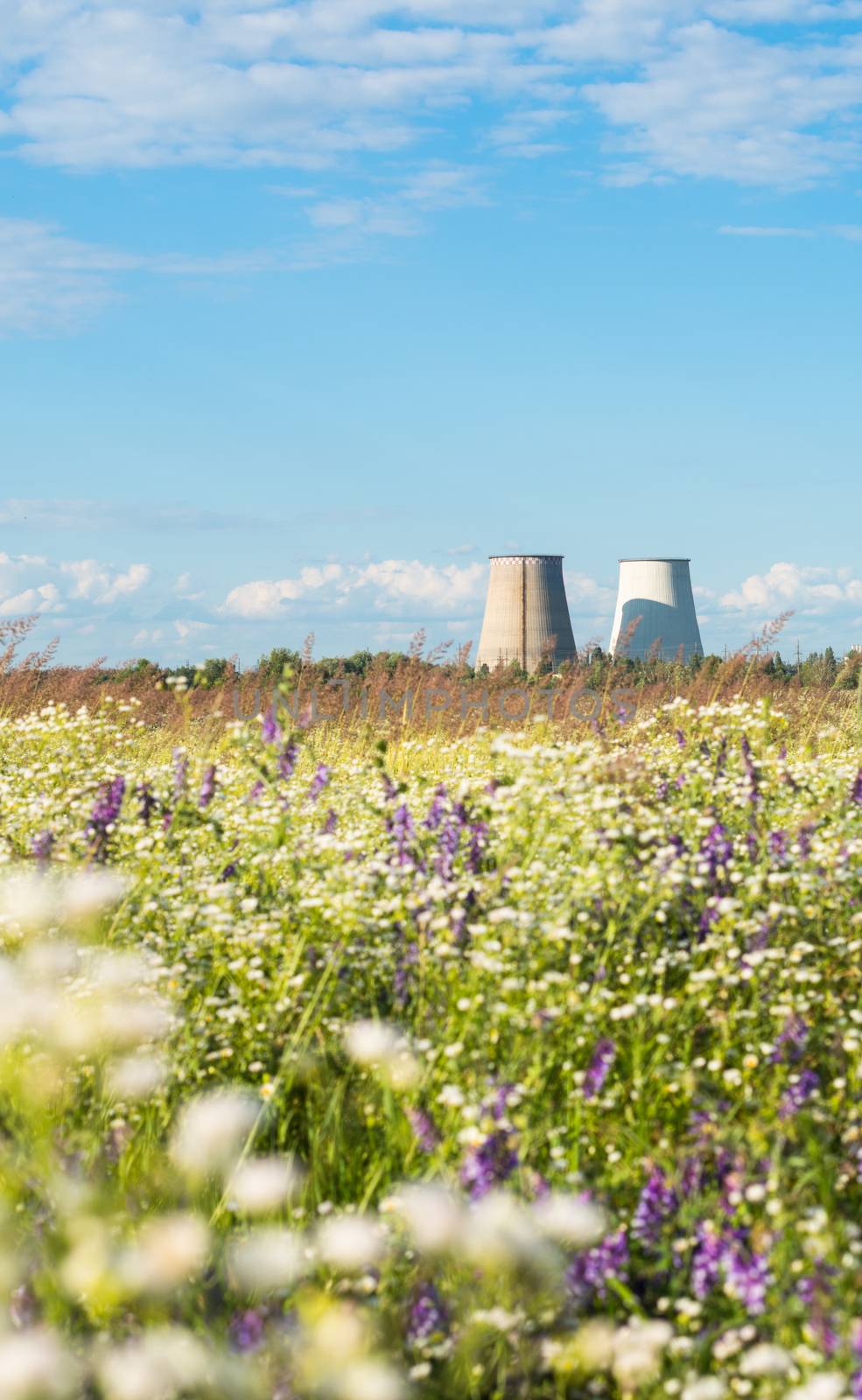 Cooling towers of the cogeneration plant near Kyiv, Ukraine. Industrial landscape.