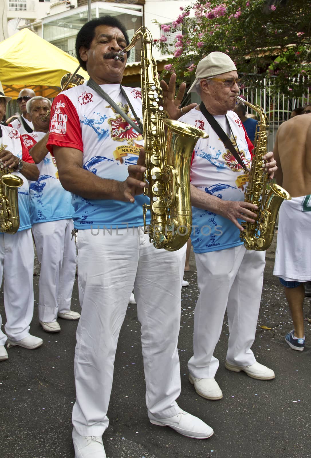 SAO PAULO, BRAZIL - JANUARY 31, 2015: An unidentified man playing trumpet in a traditional samba band participate in the annual Brazilian street carnival.