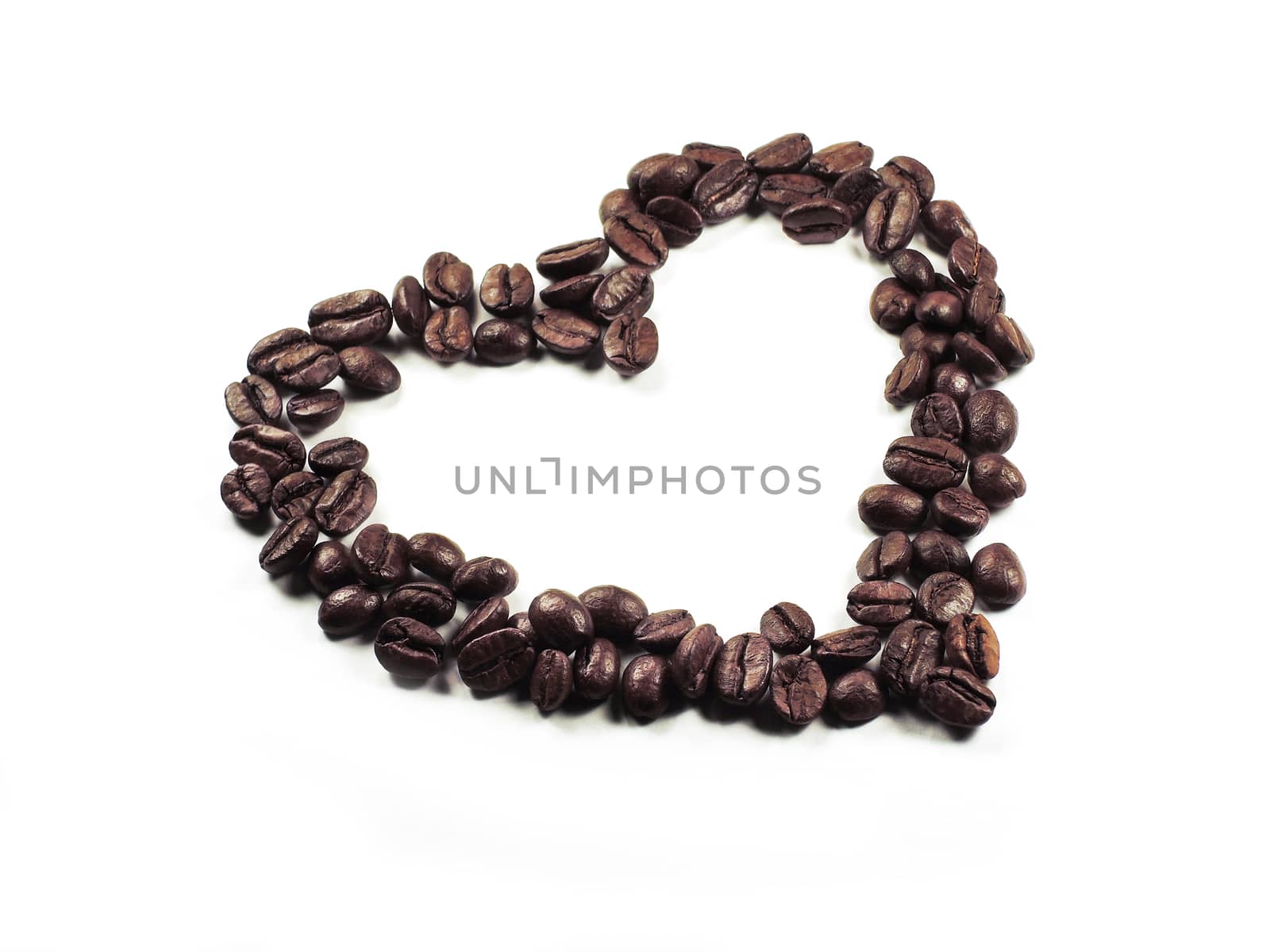 Isolate the heart of the coffee beans closeup by butenkow