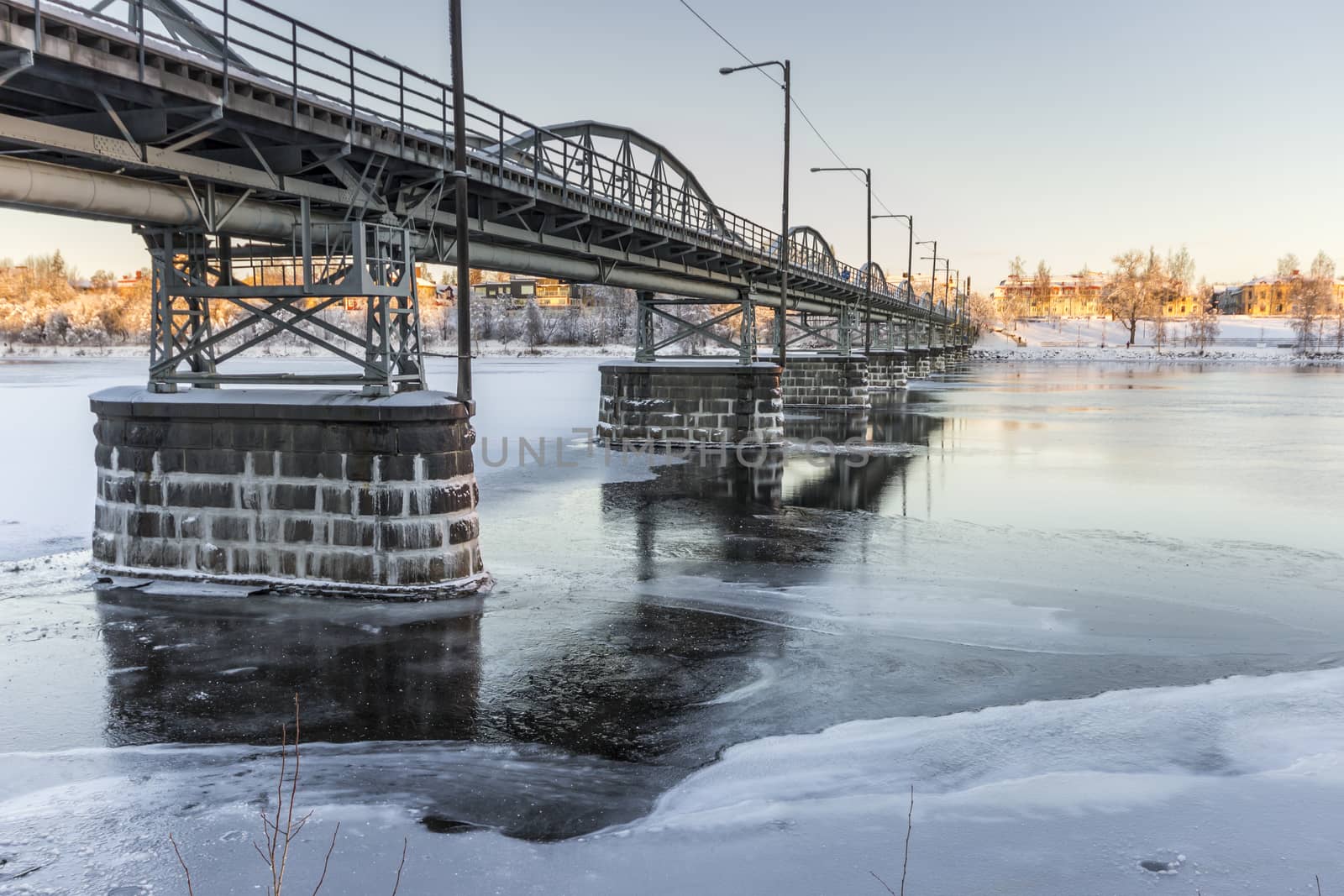 Bridge over Frozen River in Umea, Sweden