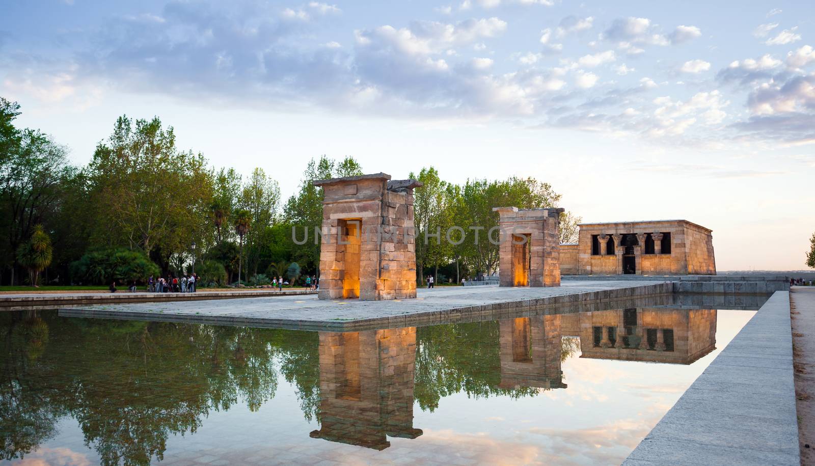 Madrid, Spain - May 10, The Temple of Debod (Templo de Debod) an ancient Egyptian temple rebuilt in Madrid with visiting tourists at dawn, Spain.