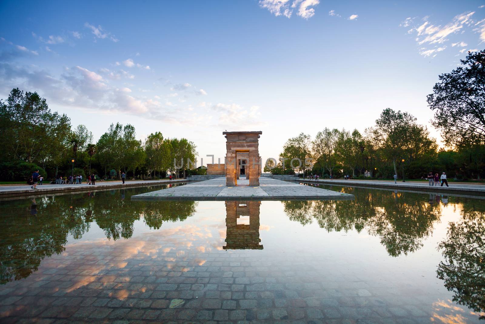 Madrid, Spain - May 10, The Temple of Debod (Templo de Debod) an ancient Egyptian temple rebuilt in Madrid with visiting tourists at dawn, Spain.
