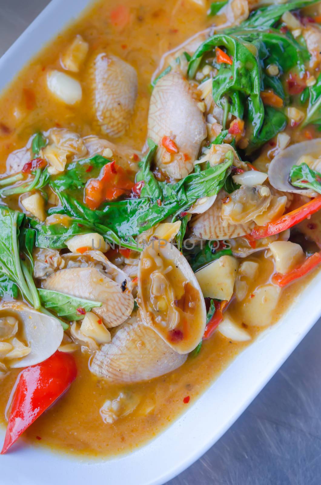 Stir fried clams with roasted chili paste and thai basil leaves