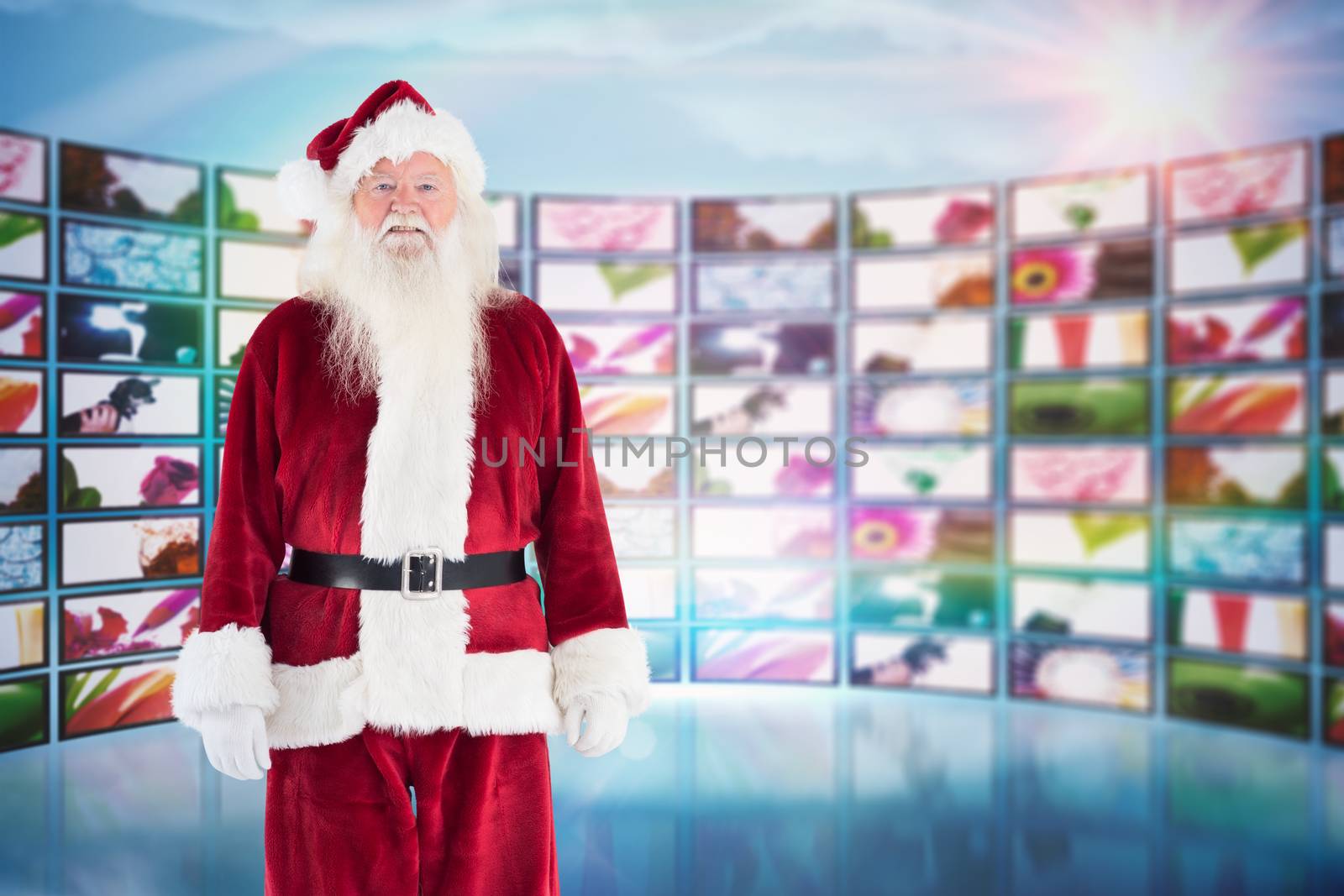 Composite image of jolly santa smiling at camera by Wavebreakmedia