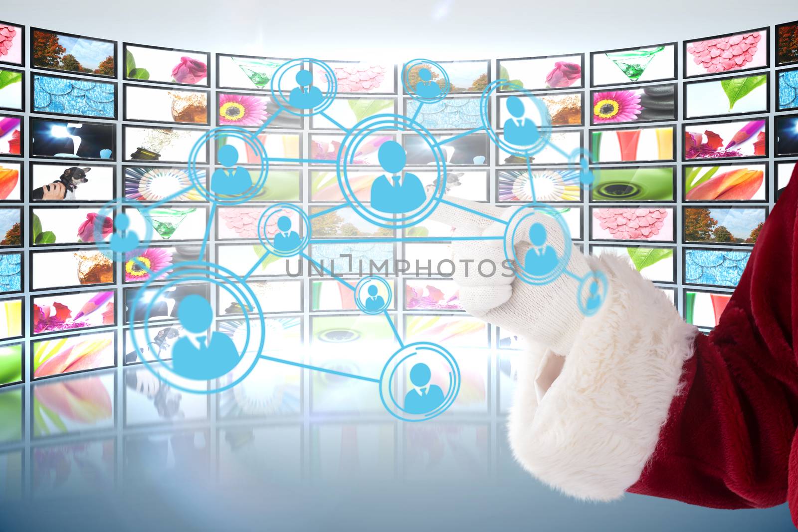 Composite image of santa claus points at something by Wavebreakmedia
