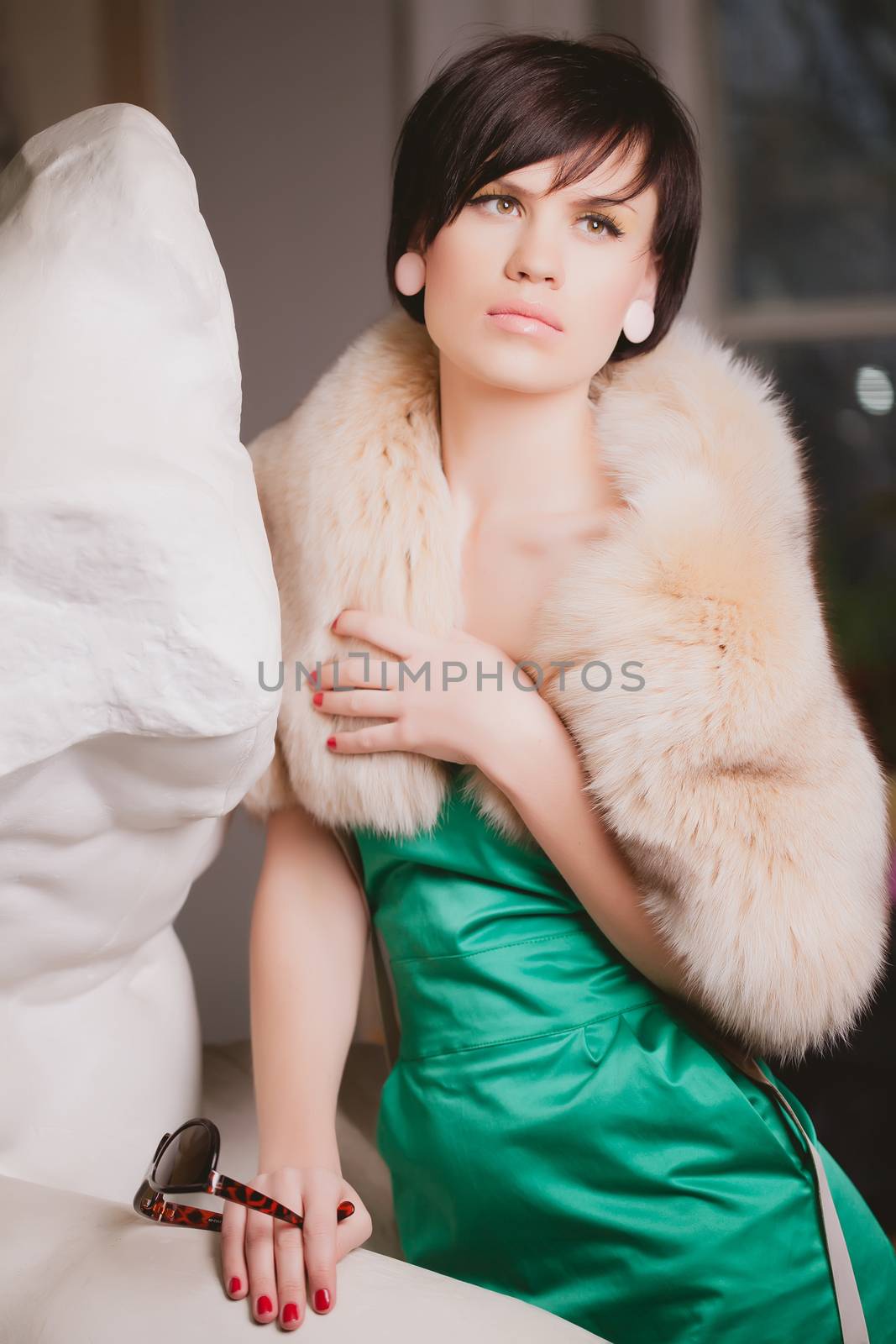 Portrait of beautiful woman with short  brown hair.