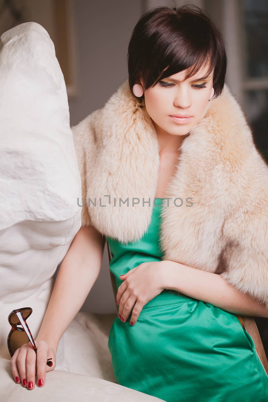 Portrait of beautiful woman with short  brown hair.