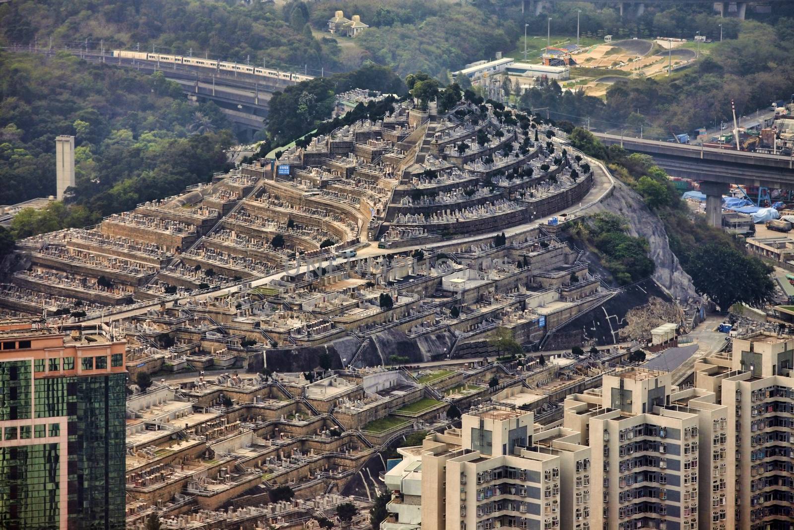 Mountain view on big city cemetery in Hong Kong