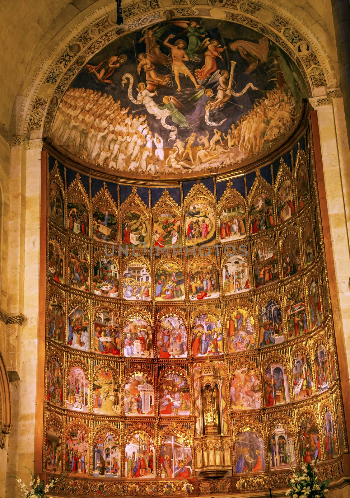 Ancient Apse House Old Salamanca Cathedral Castile Spain. 52 tablets completed in 1400s, 12 of which by Diego Delli, Italian artist, celebrating life of Jesus and Mary with fresco of final judgment above them.  Old Salamanca Cathedral next to the new Salamanca Cathedral is known as Catedral Vieja de Santa Maria.  Founded by Bishop Jerome of Perigold in the 1100s.  It was finished in the 1300s and dedicated to Saint Mary of the See 