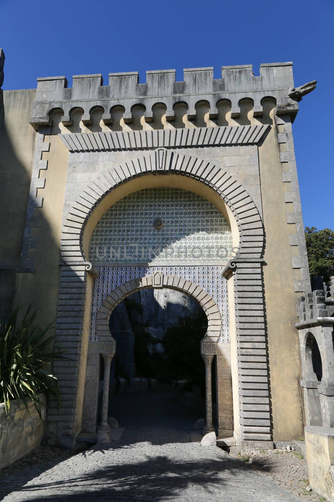 The Pena National Palace is a romantic palace in the municipality of Sintra, Portugal.