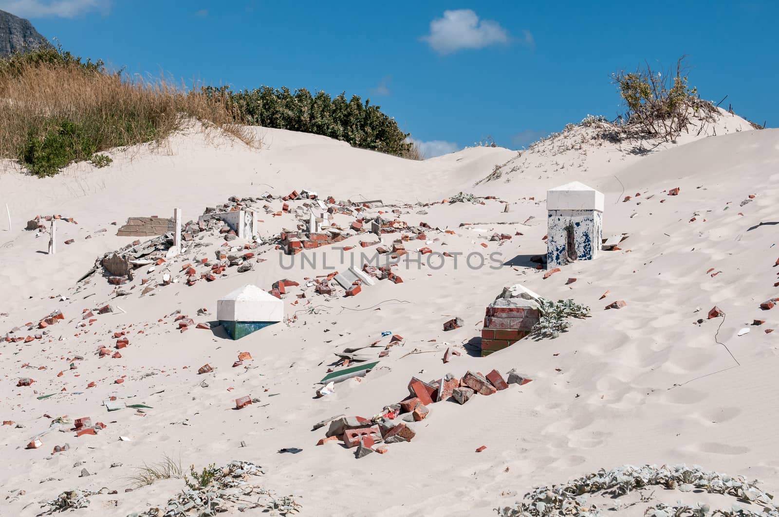 Old police station at Hout Bay reclaimed by sand dunes, Cape Town, South Africa. 

