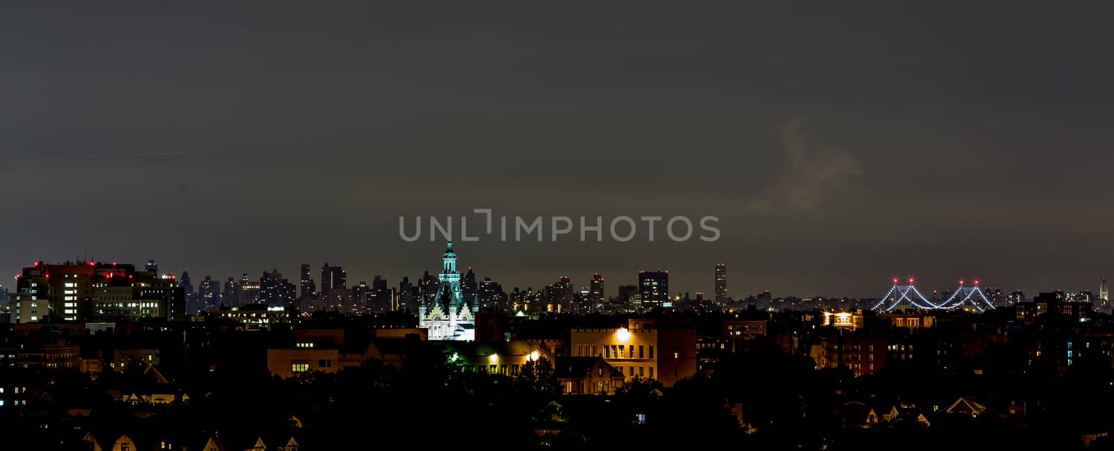 The view of Manhattan skyline at night from Queens, New York