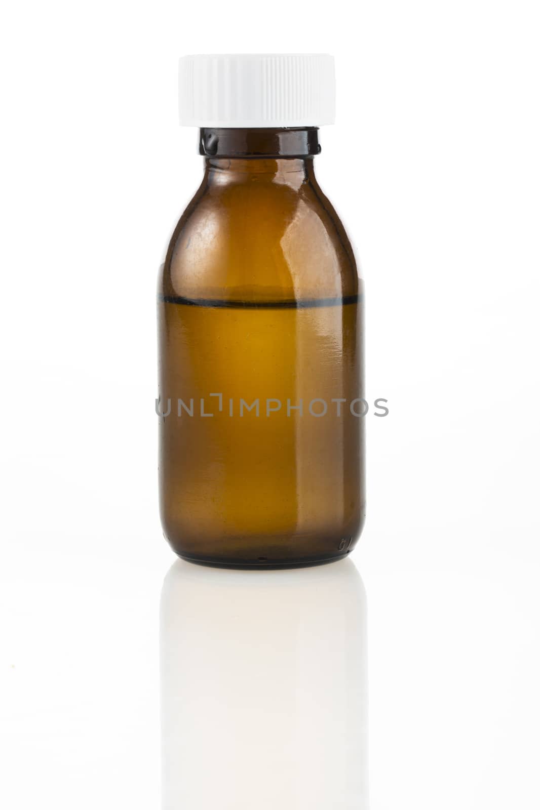 Brown medicine bottle with liquid inside and white top.