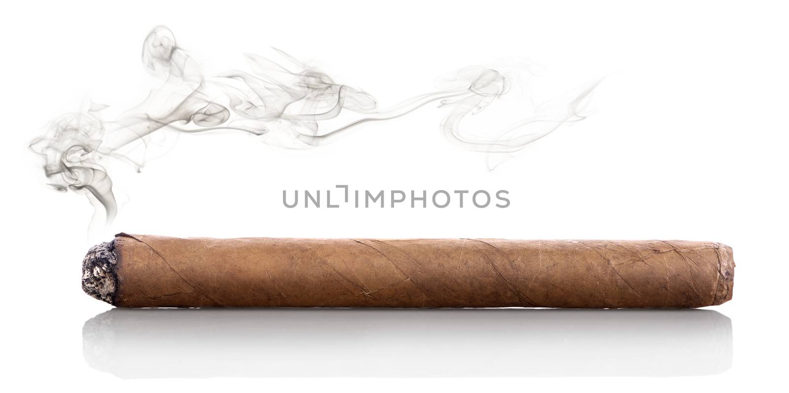 Smoking havana cigar isolated on a white background