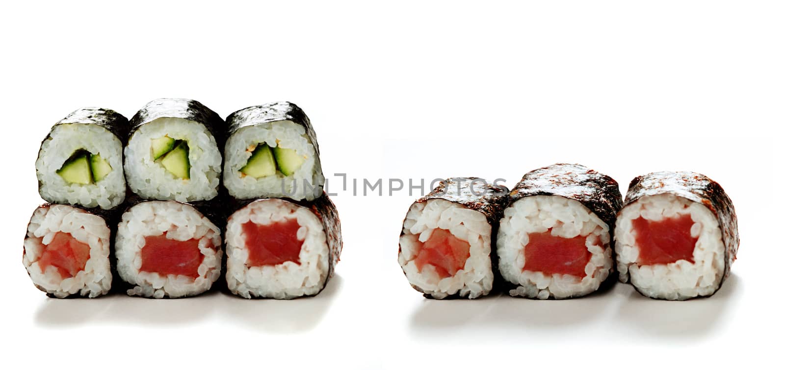 Sushi rolls isolated on white by ozaiachin