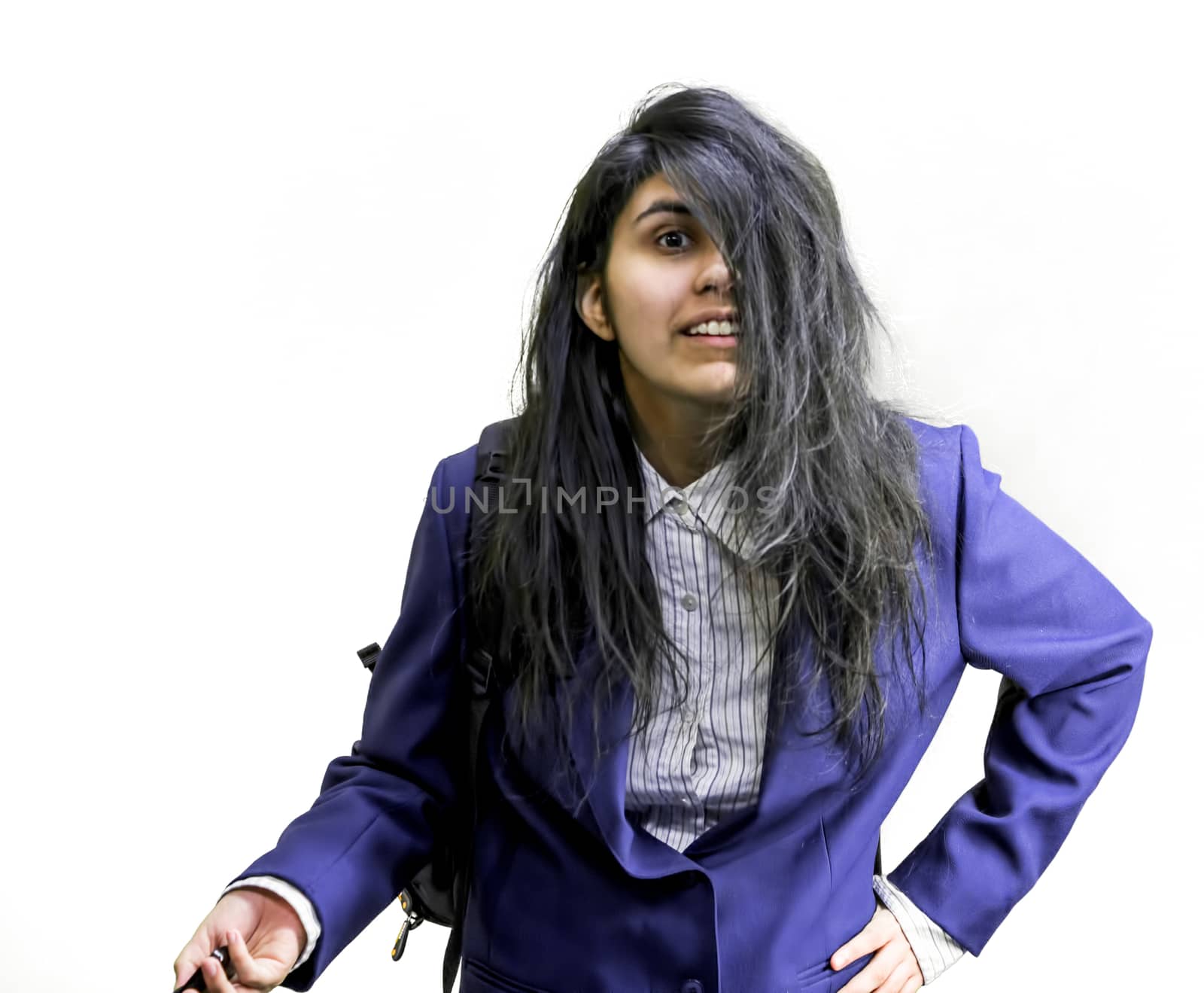 Teenage latina girl looking impatient with hand on hip