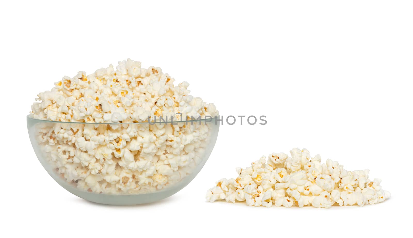 Delicious popcorn in bowl over white background