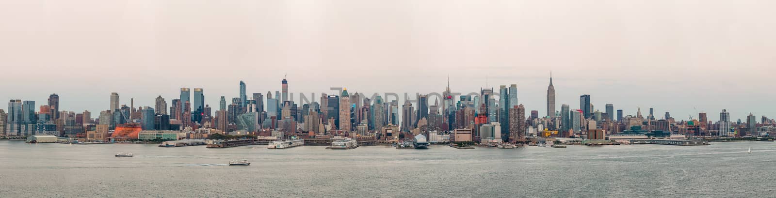 Panoramic view of Manhattan skyline with densely packed skyscrapers