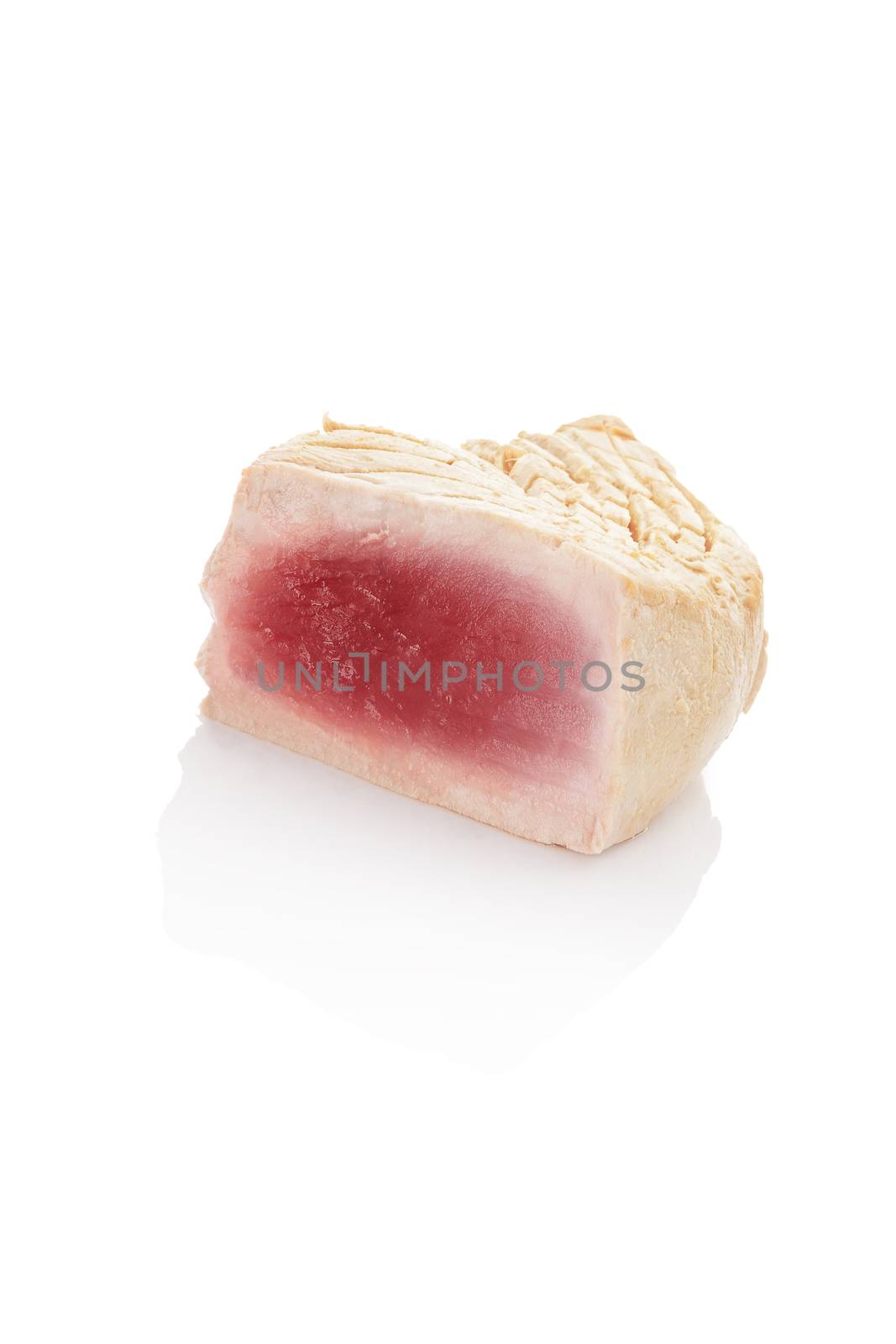 Big tuna steak isolated on white background. Healthy seafood eating. 