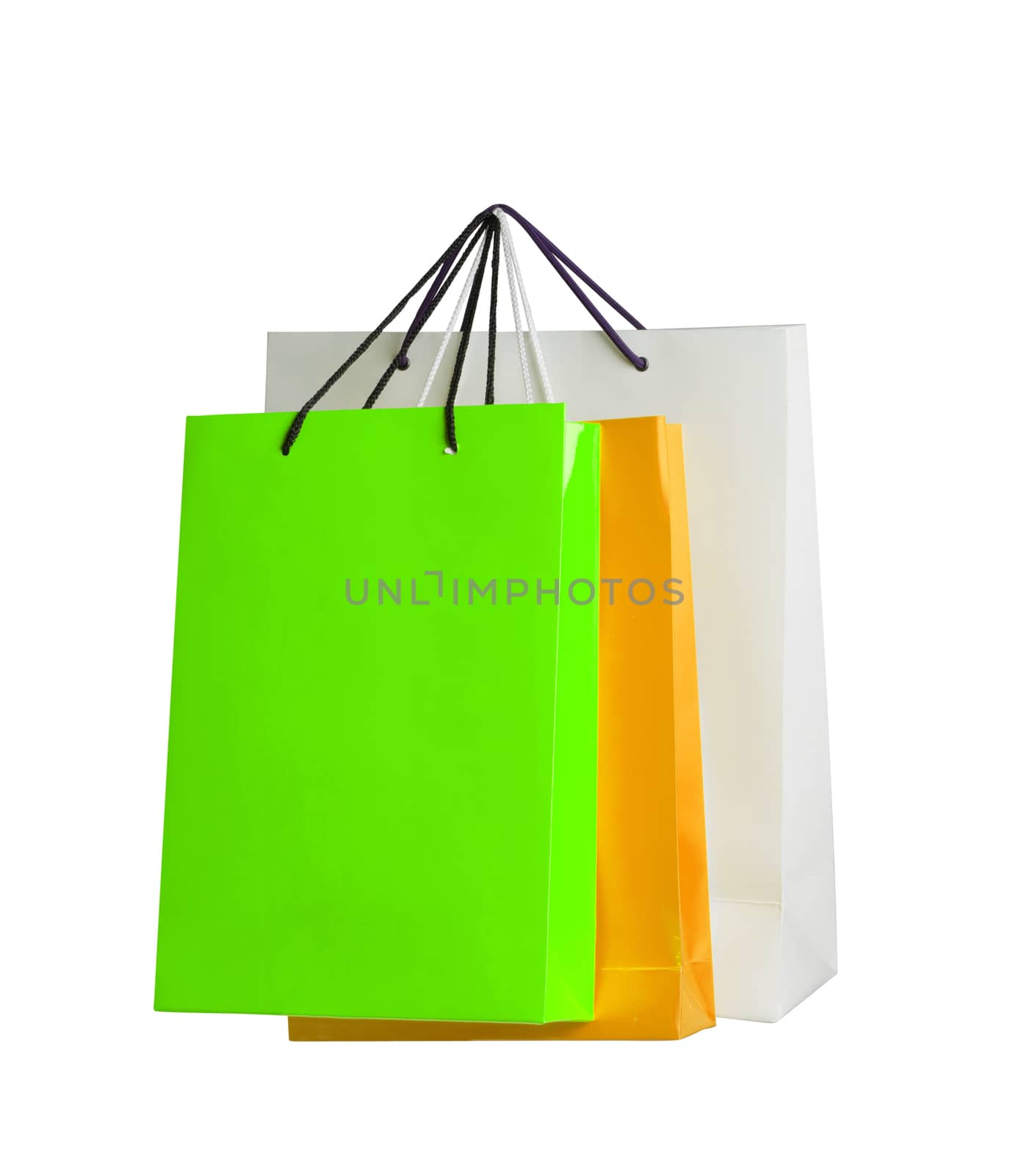 Assorted colored shopping bags on white background