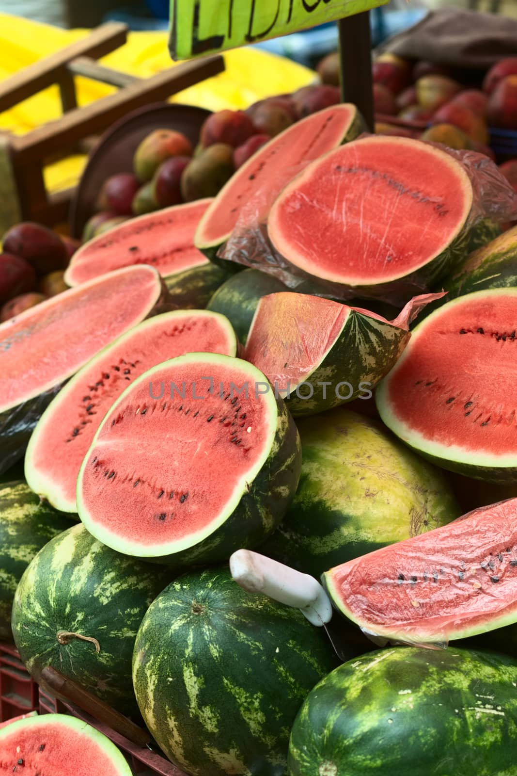 LA PAZ, BOLIVIA - NOVEMBER 10, 2014: Watermelon stand along Max Paredes street in the city center, where many fruits and vegetables are sold on the roadside on November 10, 2014 in La Paz, Bolivia (Selective Focus, Focus one third into the image)