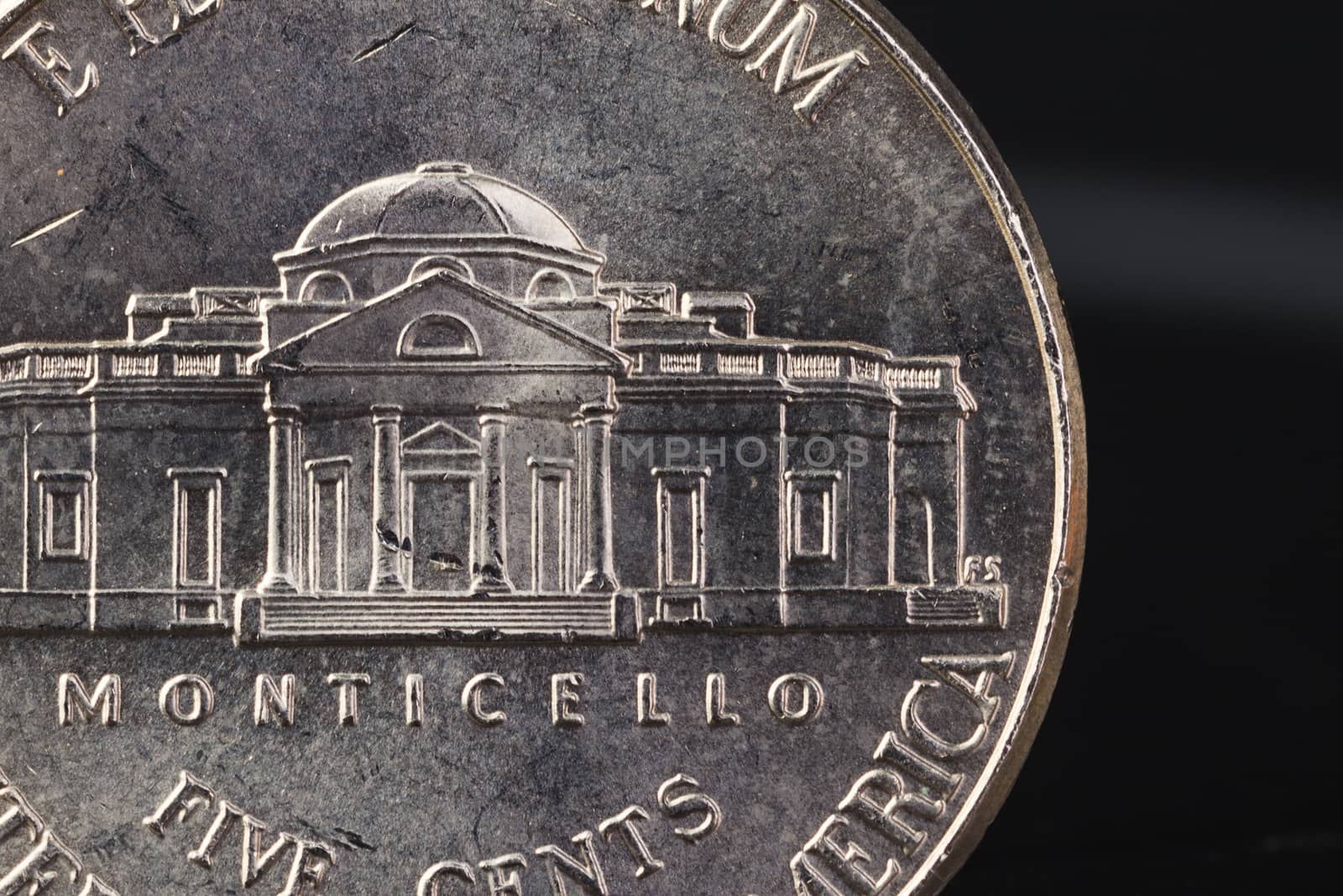 US American coin with wording "monticello" on black background