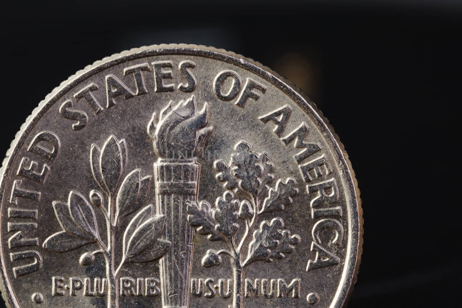 US American coin on black background