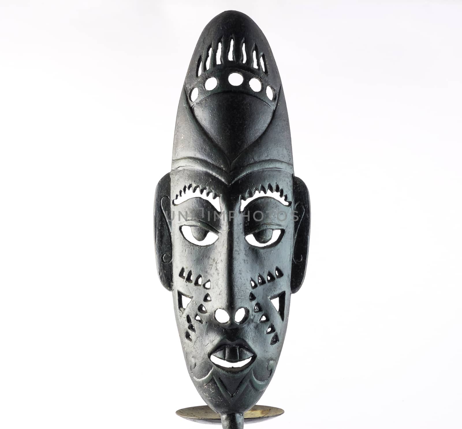 African mask isolated on a white background.