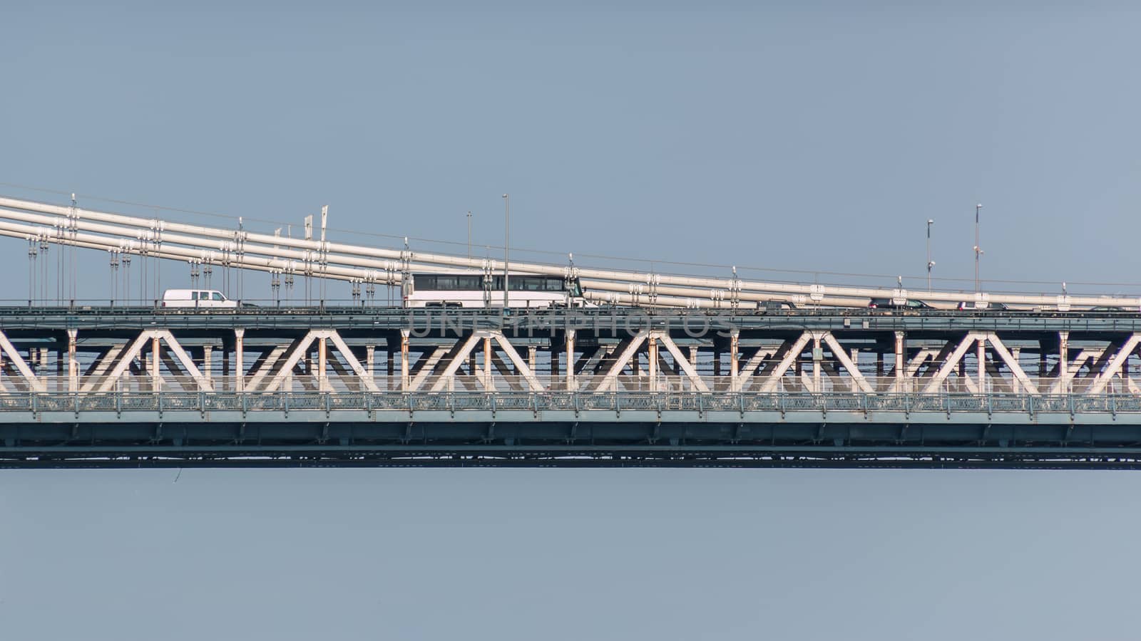 Cars and busses crossing Manhattan bridge as they travel between Queens and Manhattan