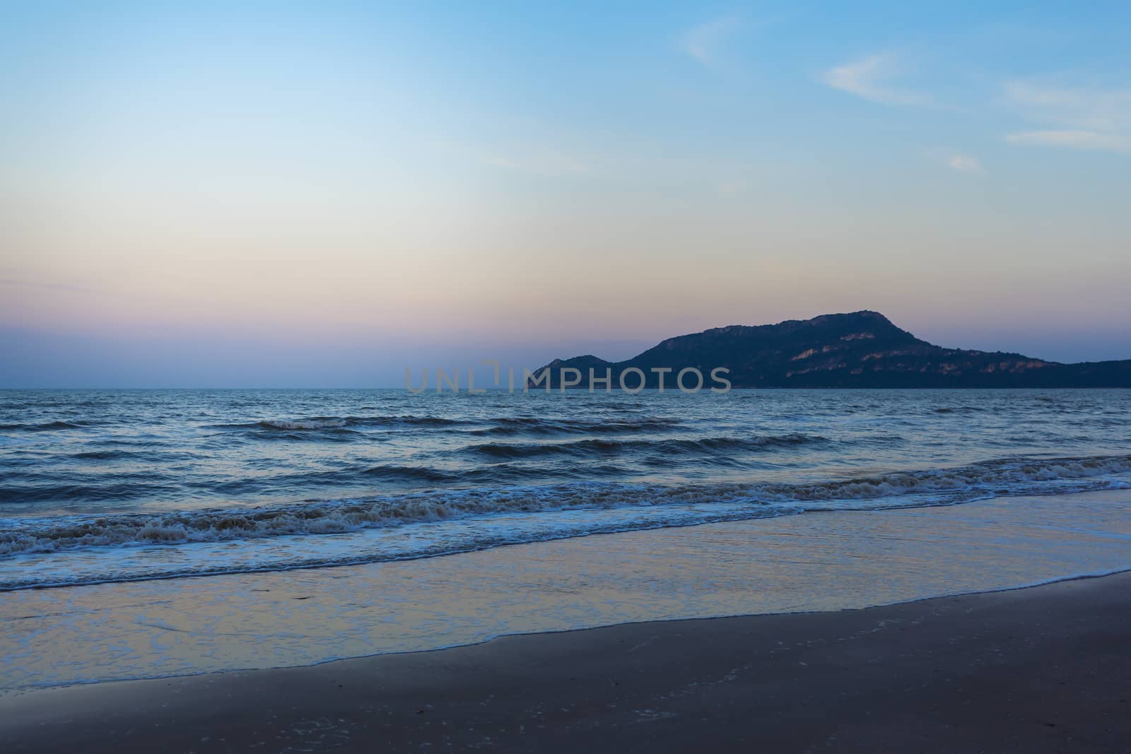 landscape with sea and mountain at sand beach