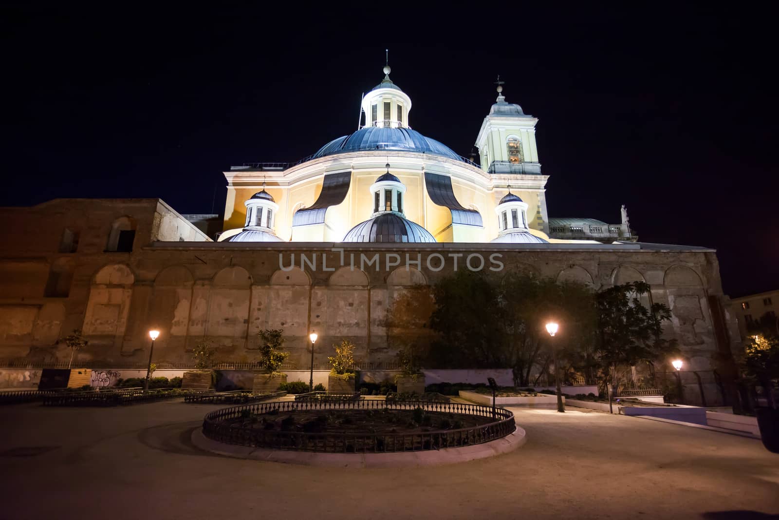 Madrid, Spain - May 6, 2012:  Side view of the Real Basilica de san Francisco el Grande on a sunny spring night in La Latina, Madrid, Spain