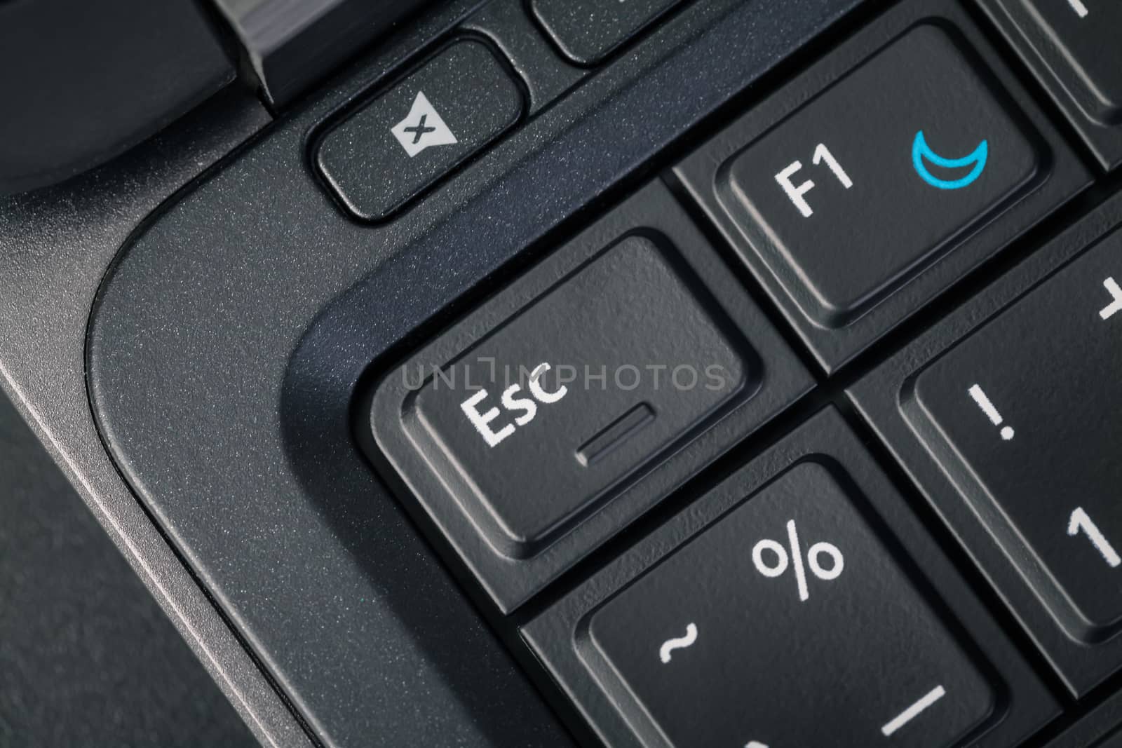 Computer keyboard - ESC and help button, close up by FrameAngel