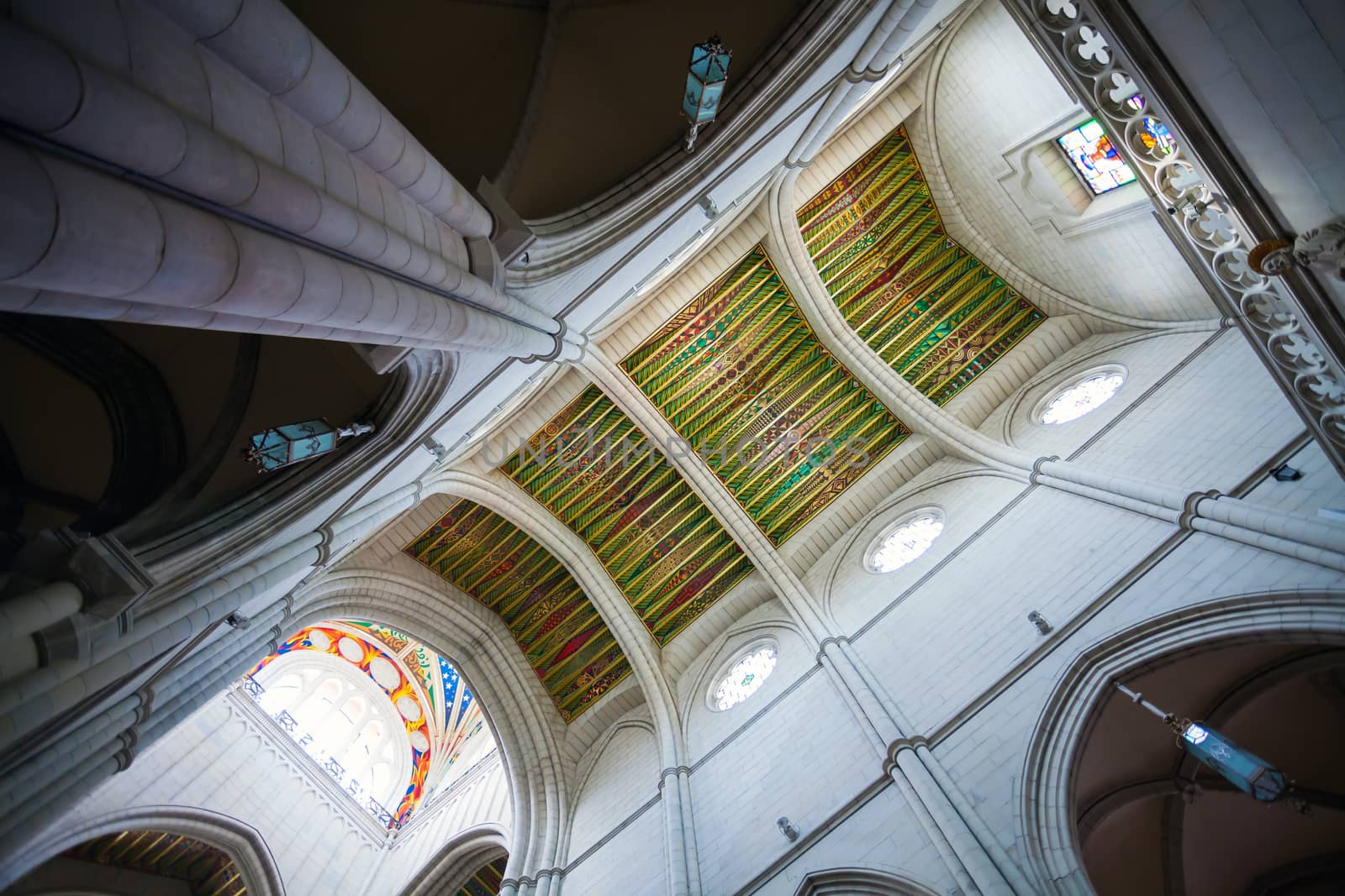 Madrid, Spain - May 6, 2012: Cathedral Almudena interior with view of the pipe organ on a sunny day in Madrid, Spain