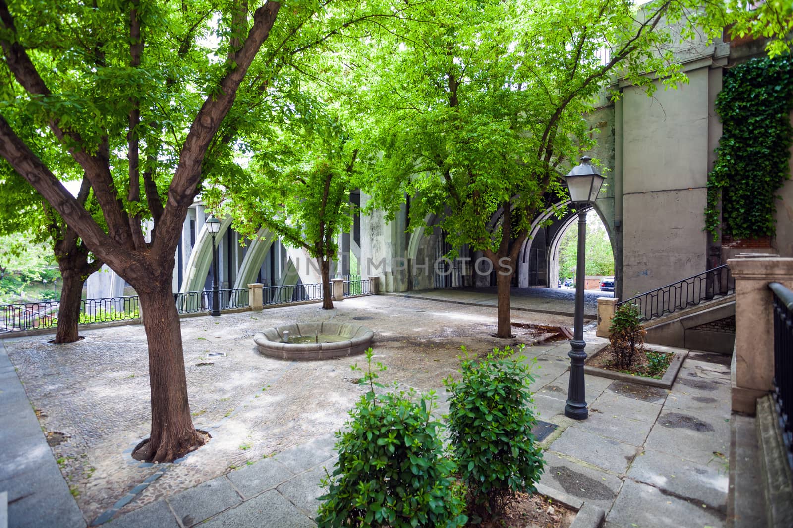 Madrid, Spain - May 6, 2012: Small park near Segovia Viaduct on spring in the city of Madrid, Spain