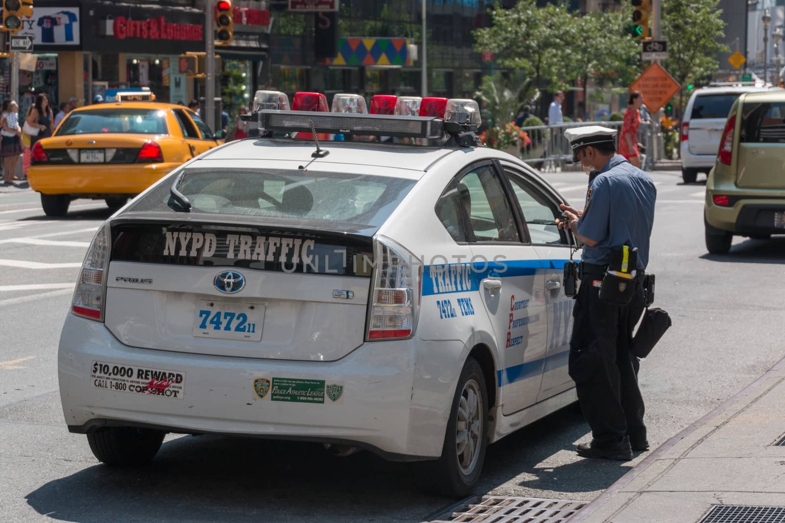 New York - Aug 20: NYPD Traffic enforces parking laws in downtown Manhattan on August 20, 2014 in New York, USA