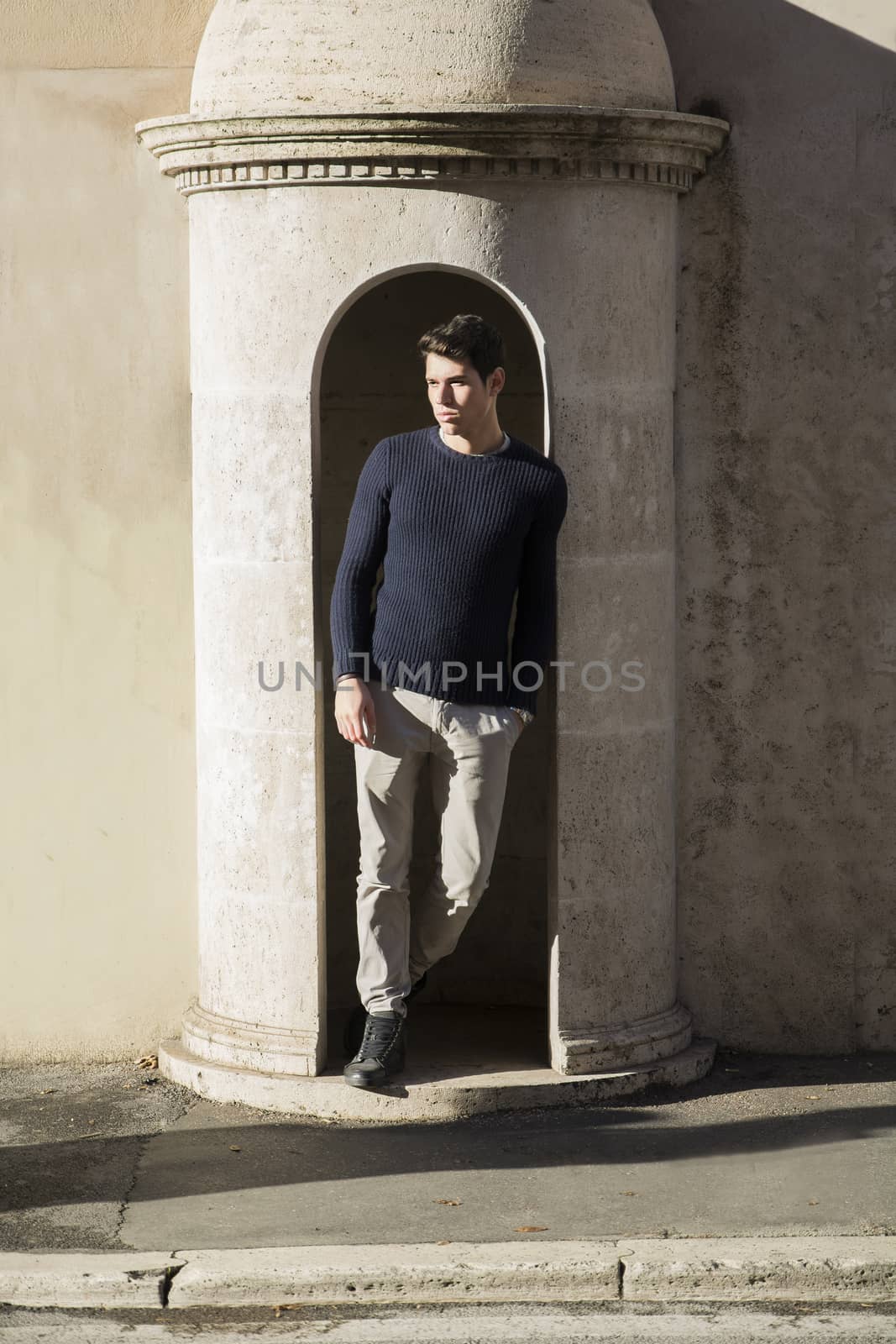 Handsome young man posing in guard's booth by artofphoto