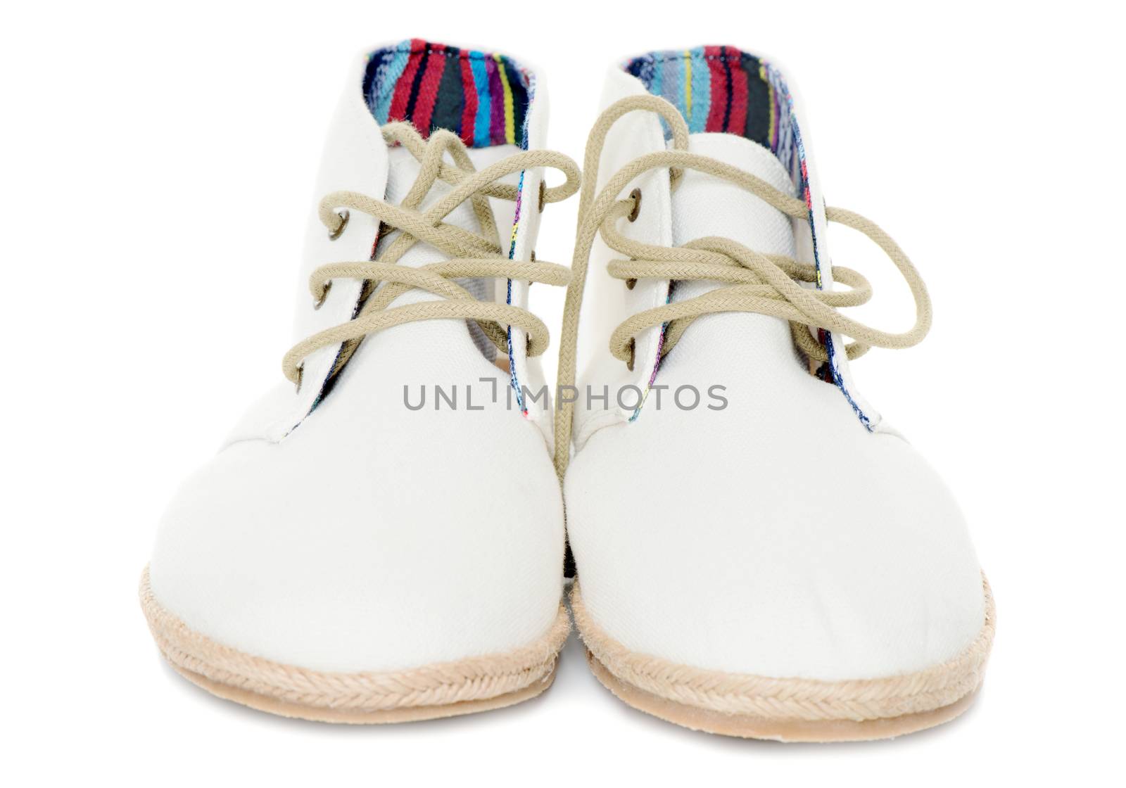 Pair of trendy canvas shoes isolated on white