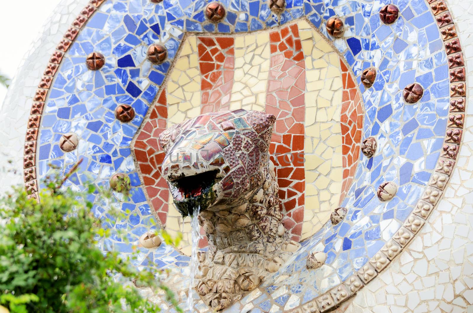 BARCELONA, SPAIN - JULY 13: Ceramic art in Park Guell on July 13, 2012 in Barcelona, Spain. It was built in 1900-14 and is part of the UNESCO World Heritage Site "Works of Antoni Gaudi".