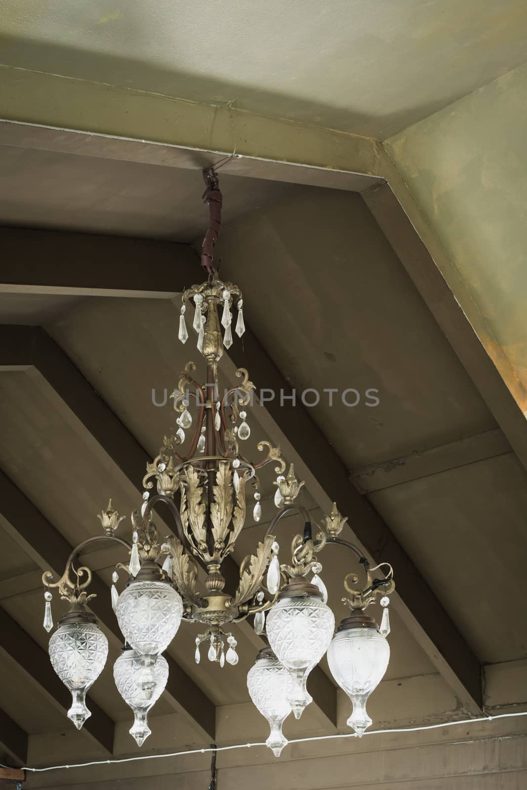 Vintage Crystal chandelier on ceiling by FrameAngel