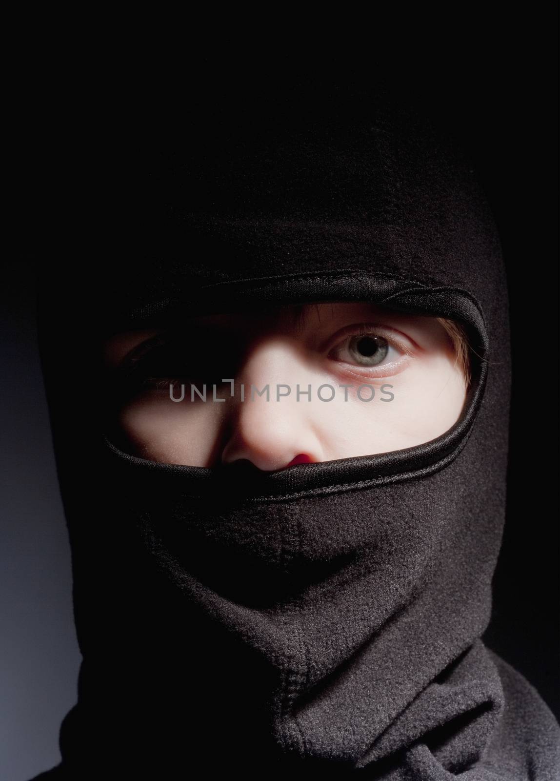Portrait of a Boy with Hood Playing Ninja by courtyardpix