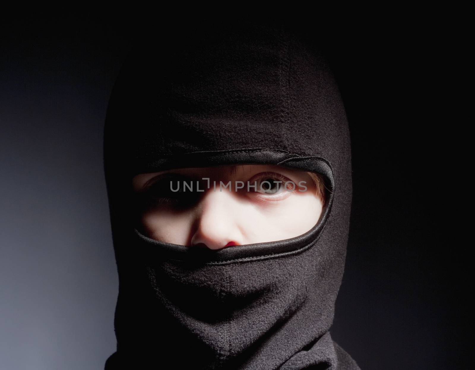 Portrait of a Boy with Hood Playing Ninja by courtyardpix