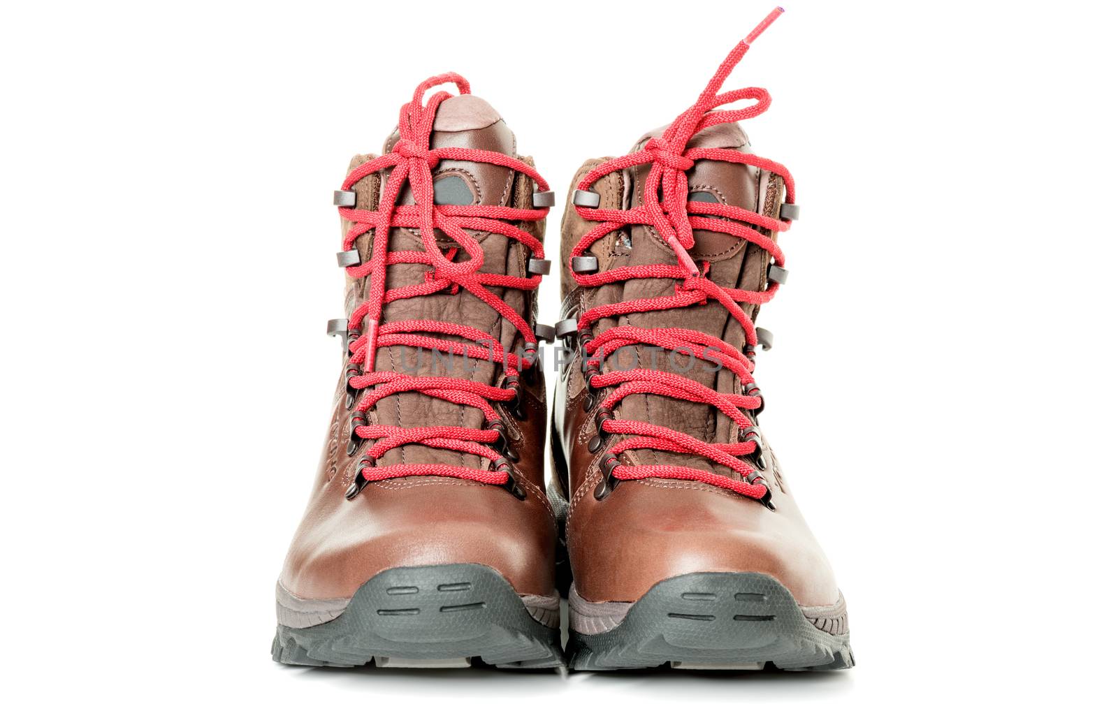 new hiking boots on white background front view by Nanisimova