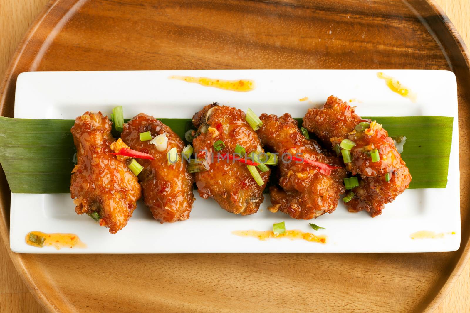 Spicy Thai Chicken Wings by graficallyminded