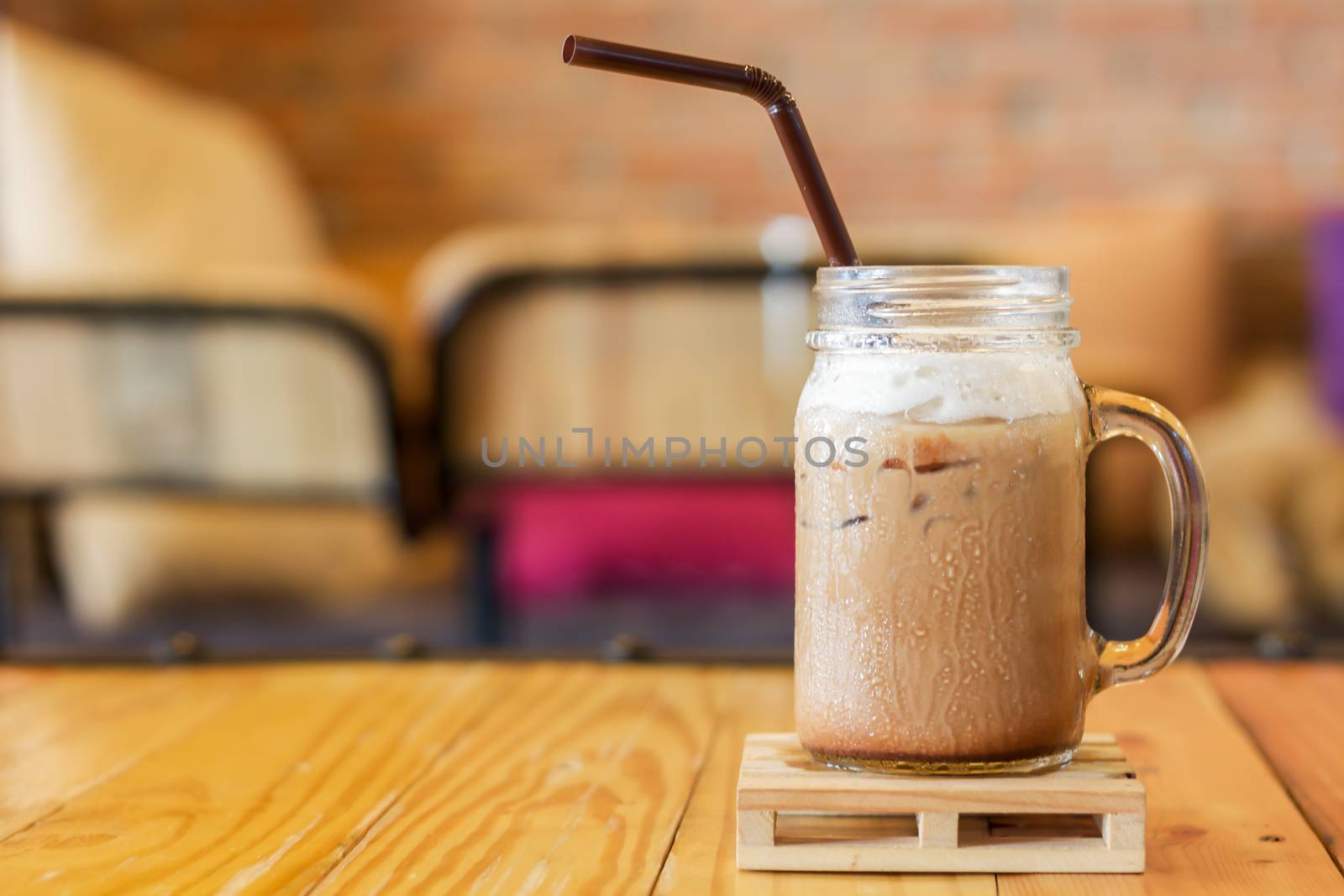 Iced caffe mocha with milk foam, stock photo